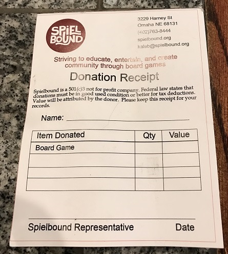 If you'd like to help out, ask a Spielbound employee for a donation card like this one.