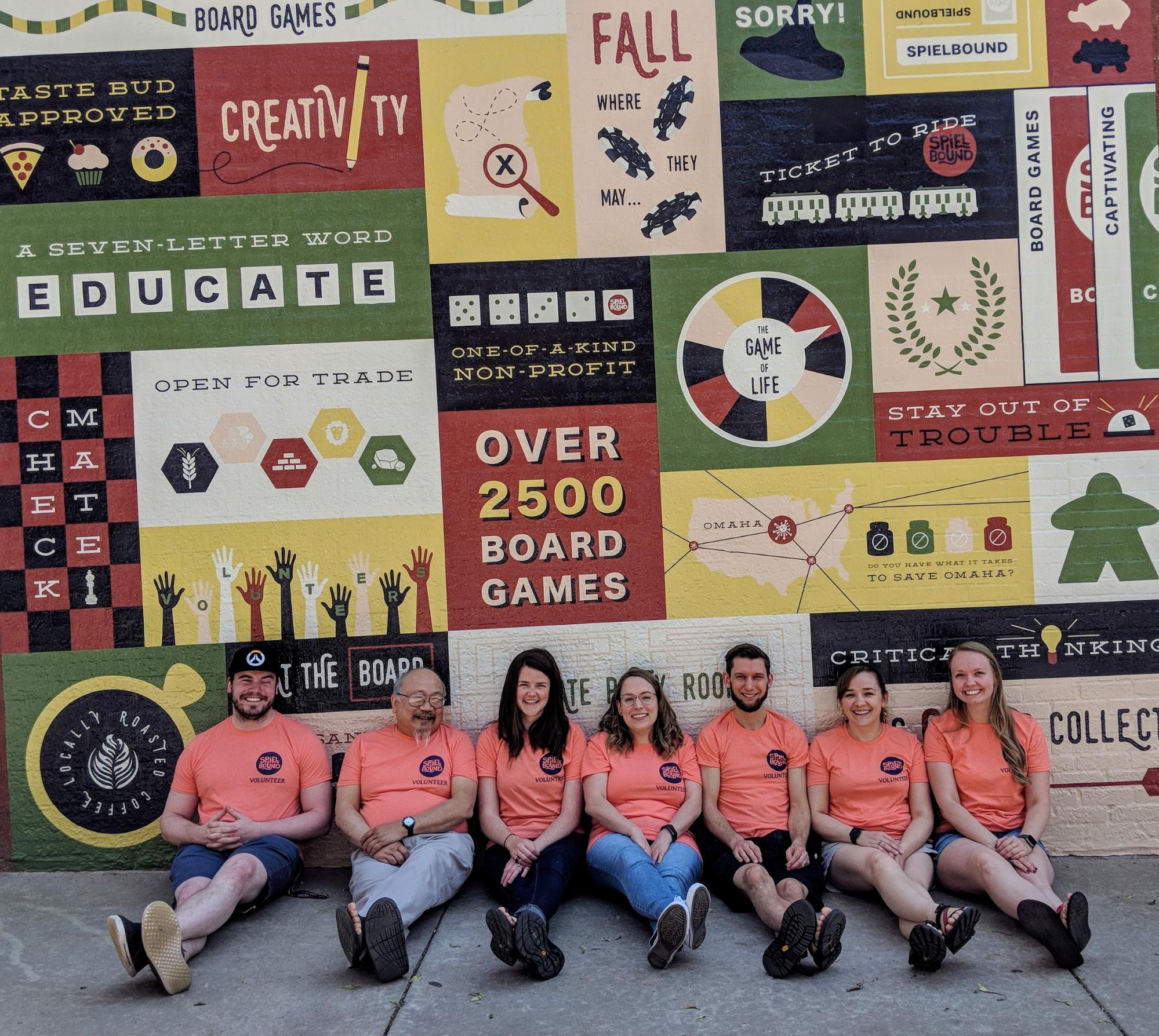 The Stay Sharp Crew in front of the Spielbound mural.